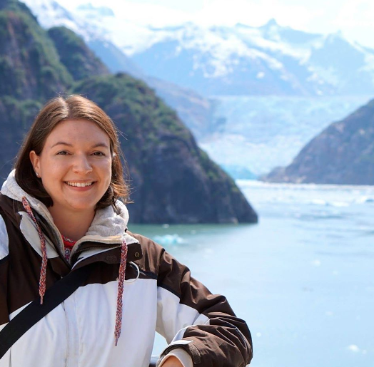 Dr. Keah Schuenemann with a fjord in the background